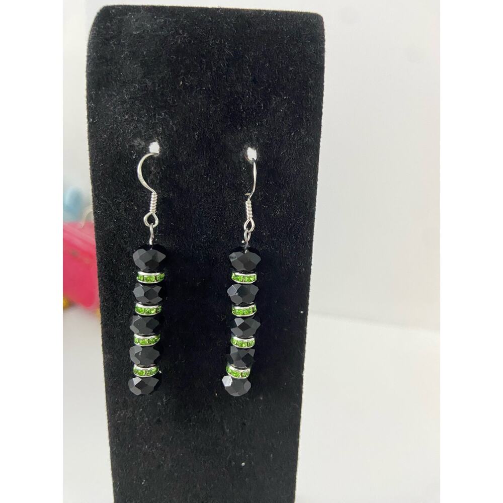 black bead earrings with green rhinestone